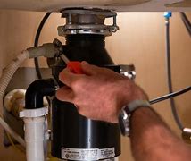 Image result for How to Remove Garbage Disposal