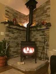 Image result for Wood Stove Mantel Ideas