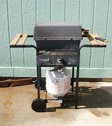 Image result for Nexgrill 4-Burner Propane Gas Grill In Stainless Steel With Side Burner, Silver