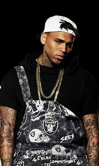 Image result for Chris Brown Wearing Earrings