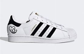 Image result for Adidas Superstar Black and Gold