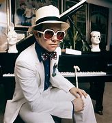 Image result for Elton John Giant White Sunglasses