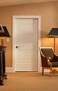 Image result for Wood Panel Louvered Closet Door