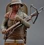 Image result for Man with Crossbow in the Bushes