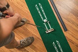 Image result for SKLZ Accelerator Pro Indoor Putting Green With Ball Return%2C 9 Feet X 16.25 Inches