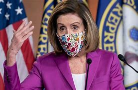 Image result for Pelosi with Documents