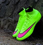 Image result for Black and Gold Football Boots