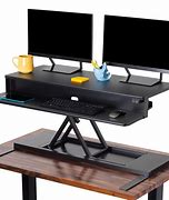 Image result for Electric Standing Executive Desk