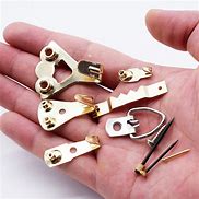 Image result for Magic Hooks Picture Hangers