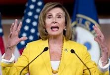 Image result for Nancy Pelosi Holding Up T-Shirt