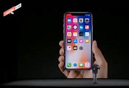 Image result for Tim Cook iPhone XS XR