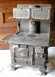 Image result for Antique Cast Iron Bucket Stove