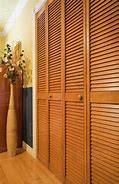 Image result for Louvered Wood Closet Doors