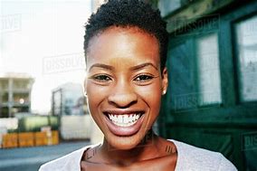 Image result for Smiling Black Woman at Desk