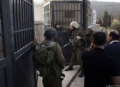 Image result for Israeli raid Palestinian camp