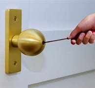 Image result for How to Unlock Door Knob with Hole
