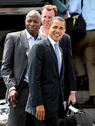 Image result for Reggie Love Obama Embrace