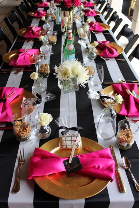 Mimosa Bar .Black & white stripes, gold & hot pink accents. Hot pink  
