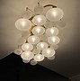 Image result for Lilypad 30 1/4" Wide Warm Brass Frosted Glass Ceiling Light - Style 281W0