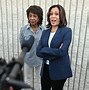 Image result for Kamala Harris Rolled Up Sleeves