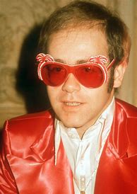 Image result for Elton John in the 80s Sunglasses