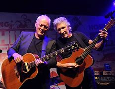 Image result for David Gilmour Giving the Finger to Roger Waters
