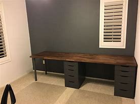 Image result for IKEA Black Desk Wooden