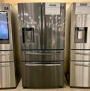 Image result for Stainless Steel Refrigerator with Black Appliances