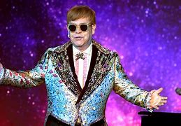 Image result for Elton John Singing Hauliula Now