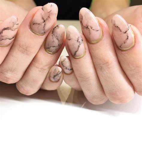 Marble Accents nude and black nail designs