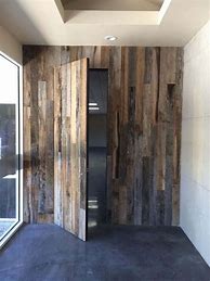 Image result for Hidden Door Wall Paneling