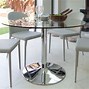 Image result for Round Glass Dining Table and Chairs