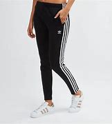Image result for Tight-Fitting Adidas Track Pants