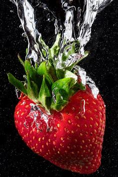 Strawberry splash | A fresh strawberry plunging into a glass… | Jarrod ...