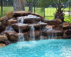 Image result for Swimming Pool Rock Waterfalls