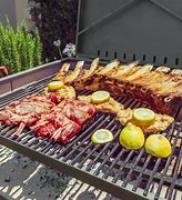 Image result for Nuke BBQ Pampa 30" Argentinian-Style Gaucho / Charcoal Grill