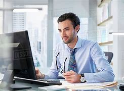 Image result for Someone Working at a Desk