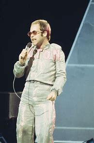 Image result for Elton John Costumes 70s