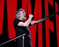 Image result for Roger Waters with Gun