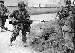 Image result for WWII Reenactment Running Holding Rifle