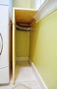 Image result for Stacked Washer and Dryer Cabinet