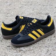 Image result for Yellow and Red Adidas Mismatch