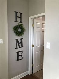 Image result for How to Decorate with Wreaths On Walls