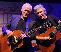 Image result for David Gilmour and Roger Waters Playign Donkey Kong
