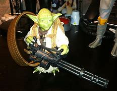 Image result for Baby Yoda with a Gun
