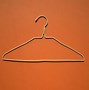 Image result for White Female Cloth Hanger with Black Background