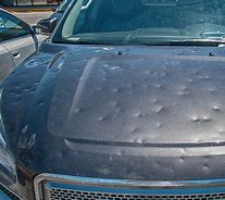 Image result for Hail Dented Car