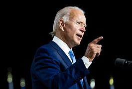 Image result for Photo of Joe Biden About to Hake a Hand