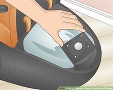 Image result for how to change a bag on a vacuum cleaner