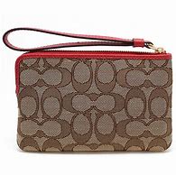 Image result for coach women's corner zip wristlet in signature canvas with ornament print - gold/brown black multi